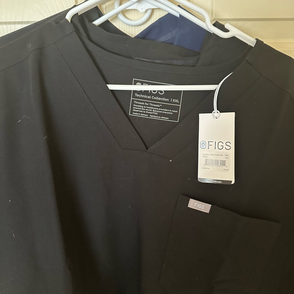 Complete sets of men’s scrubs.